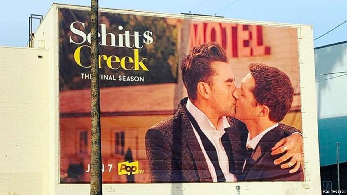 Two men kissing from Schitt's Creek.