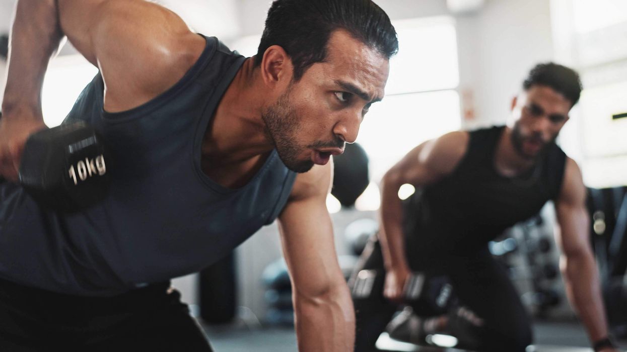 Two men working out at the gym