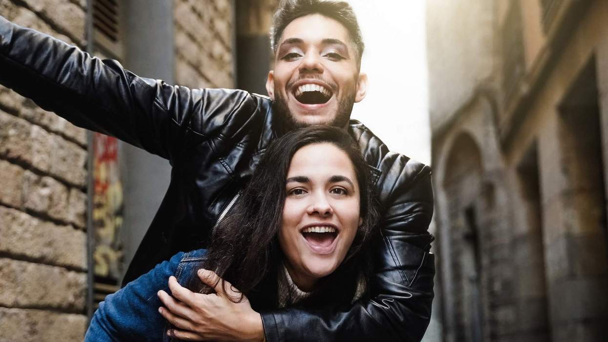 Two people celebrating together.