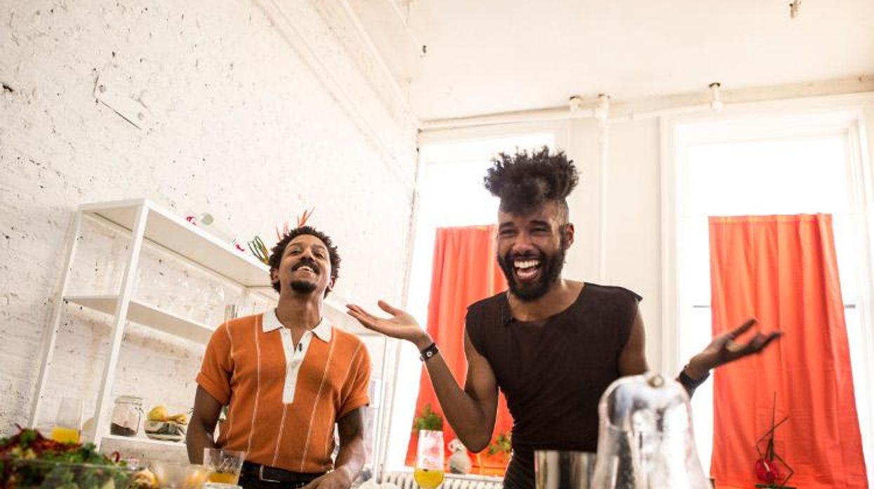two queens in a kitchen