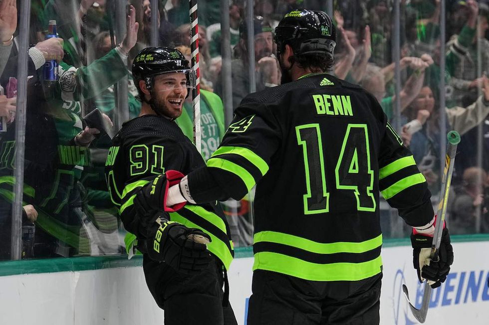 Tyler Seguin #91, Jamie Benn #14 and the Dallas Stars celebrate a goal against the Toronto Maple Leafs