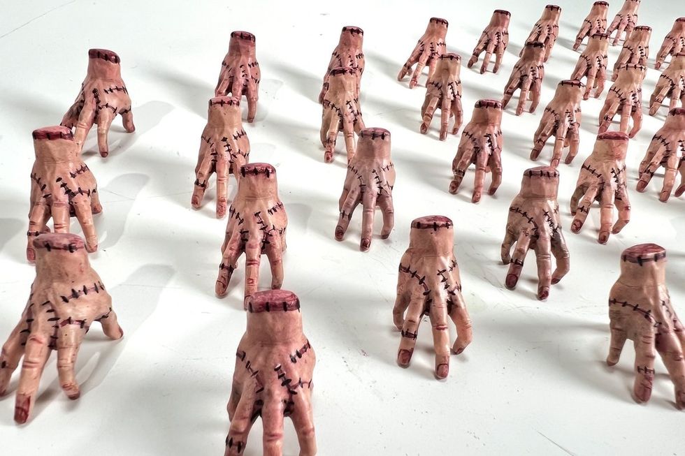 \u200b3D printed Thing hands for custom Labubu toys made by Marko Monroe for the cast of Netflix's Wednesday