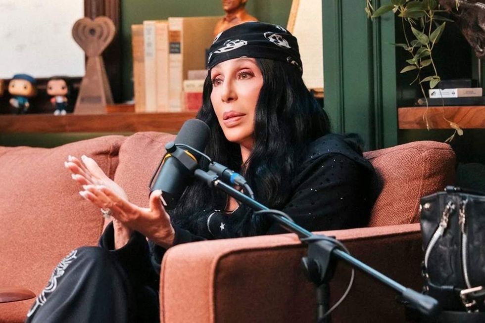 \u200bCher on the Armchair Expert podcast cohosted by Dax Shepard and Monica Padman