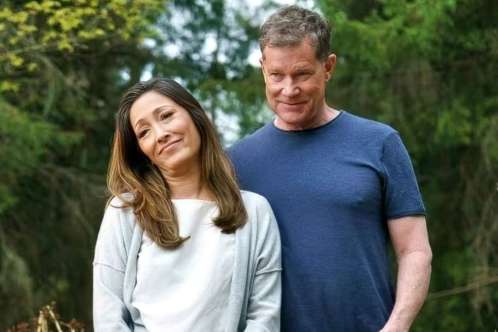 \u200bChristina Chang as Yuna Hollander and Dylan Walsh as David Hollander on Heated Rivalry