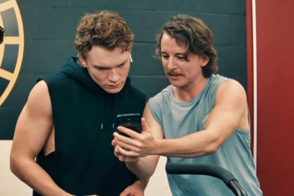 \u200bConnor Storrie as Ilya Rozanov and Harrison Browne as Connors on Heated Rivalry season 1 episode 4