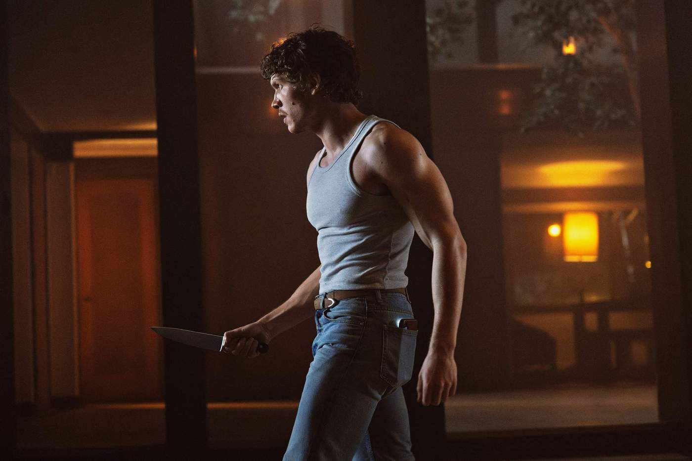 \u200bConnor Storrie holding a knife in 'Look Behind You'