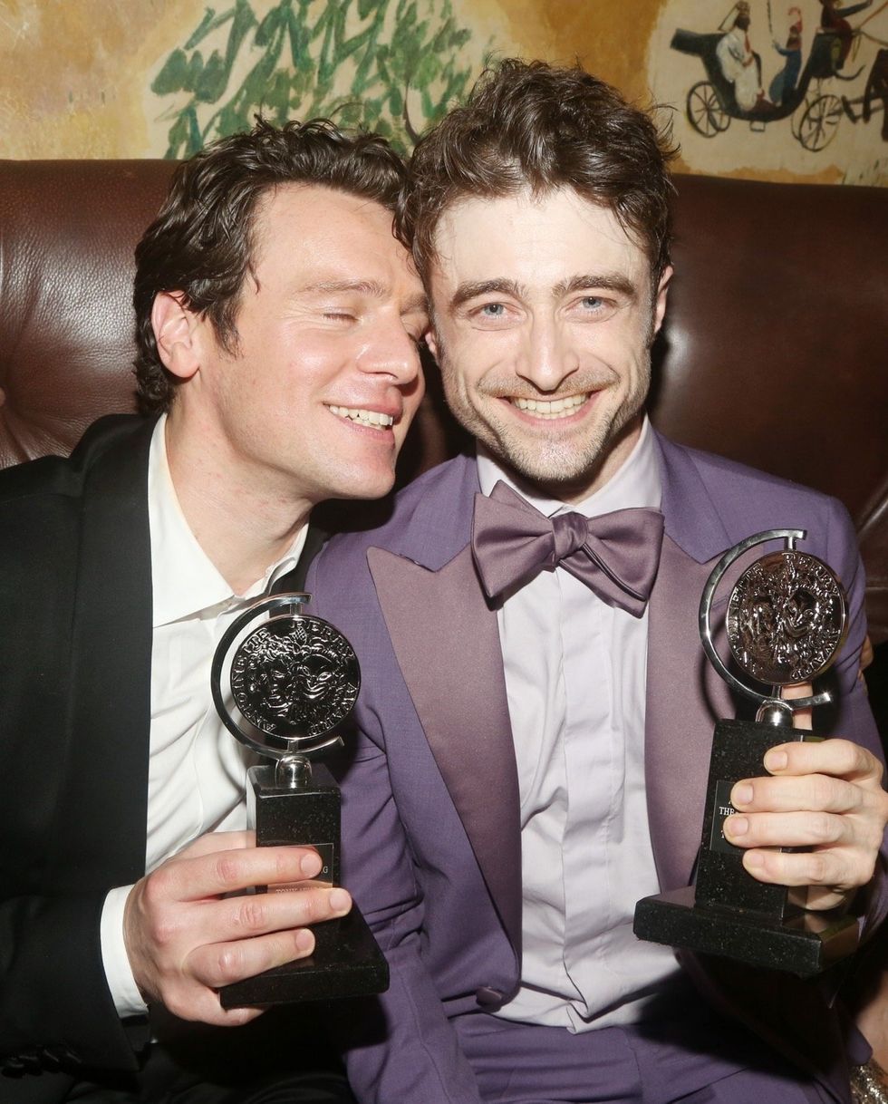 \u200bJonathan Groff and Daniel Radcliffe celebrating their wins for Merrily We Roll Along at the 2024 Tony Awards