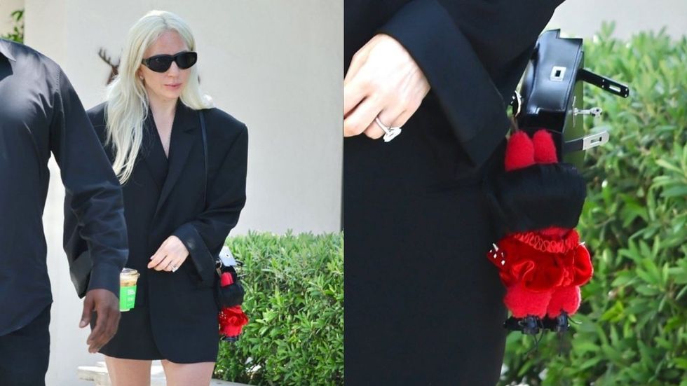 \u200bLady Gaga seen in a video walking with her custom Labubu made by Marko Monroe