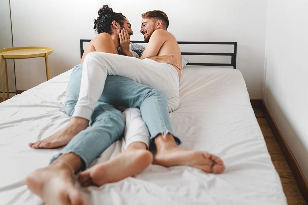\u200bTwo gay men in bed together.