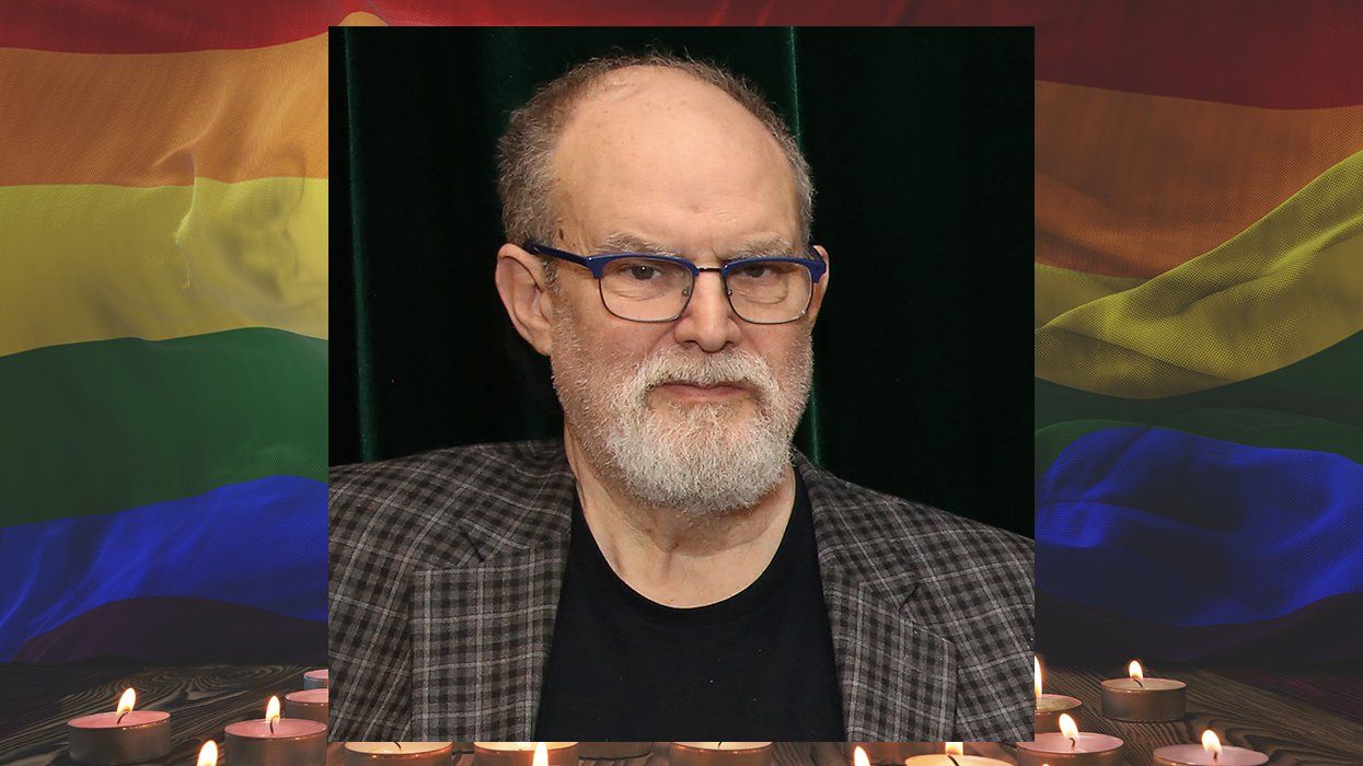William Finn a member of the creative team of The Royal Family of Broadway over a rainbow flag and memorial candle background