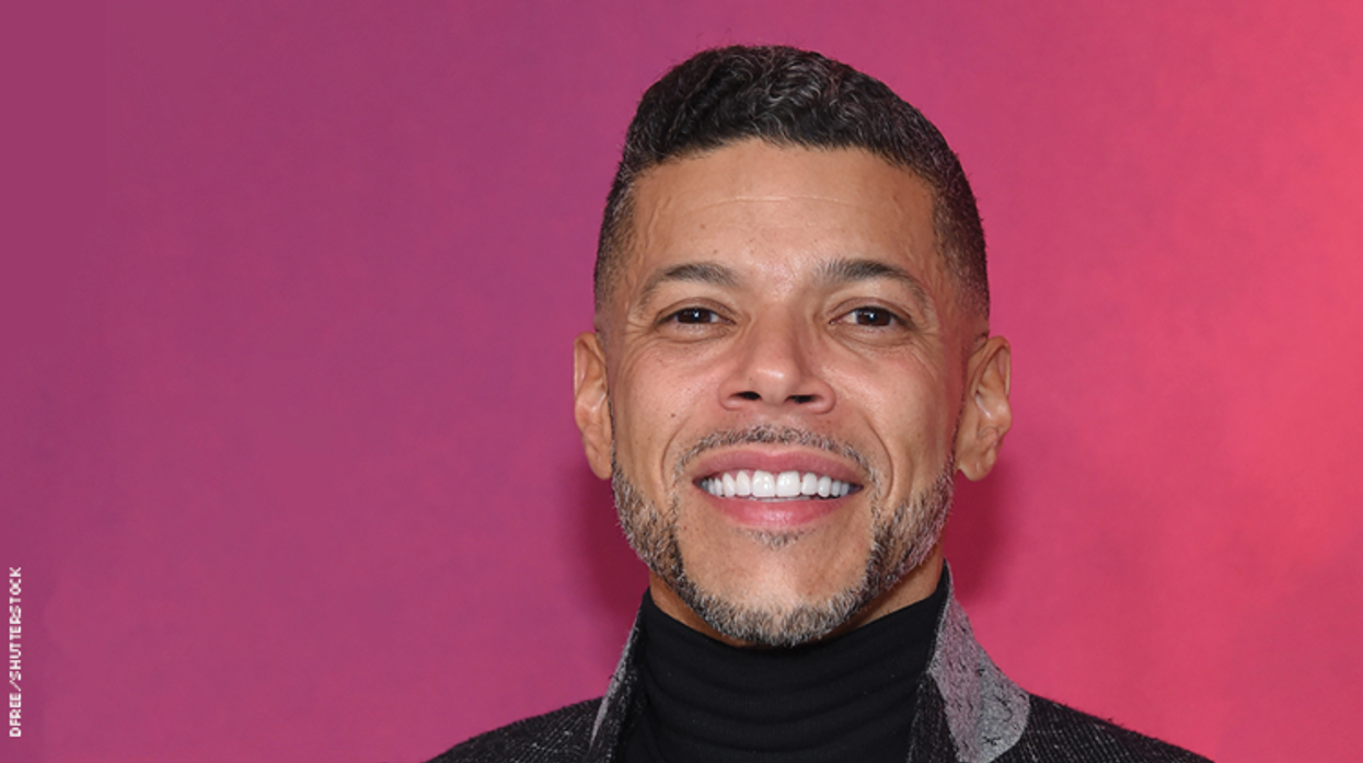 Wilson Cruz on a red carpet.