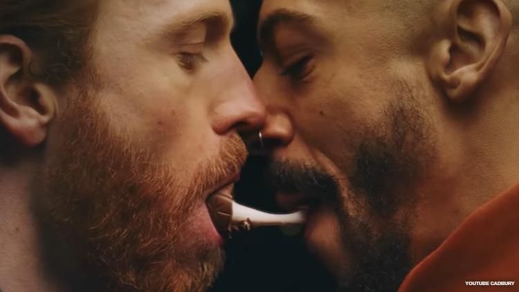 Cadbury comes out with Creme Egg commercial showing two men kissing and sharing an egg between them.