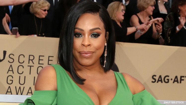 Niecy Nash on a red carpet