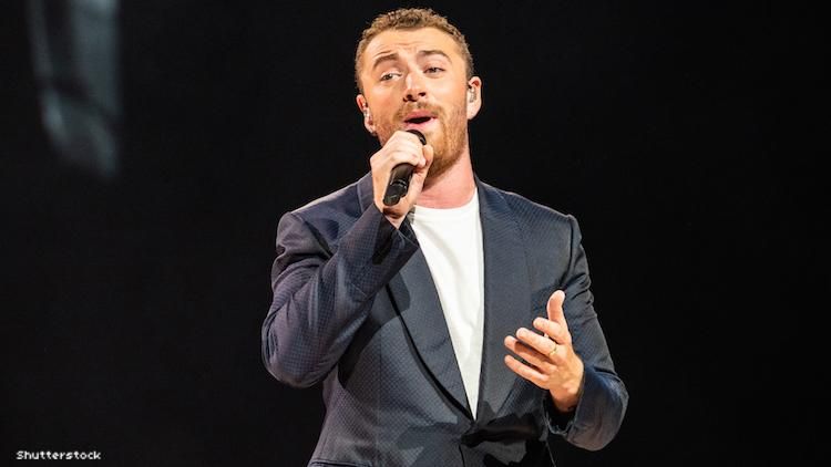 Sam Smith performing onstage in 2018.