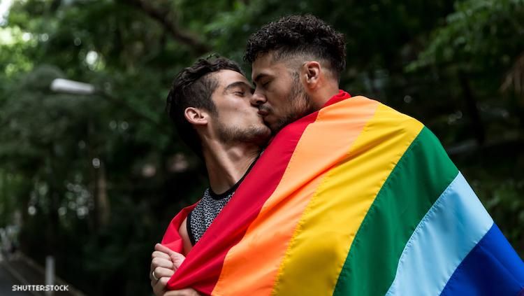 Men kissing at Brazil pride.