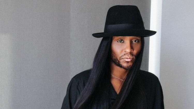 Law Roach wearing a hat. 