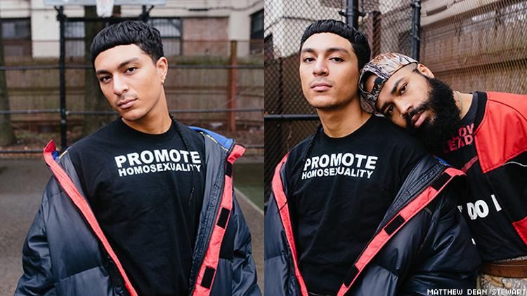 Two boys in "Promote Homosexuality" shirts by Willie Norris.