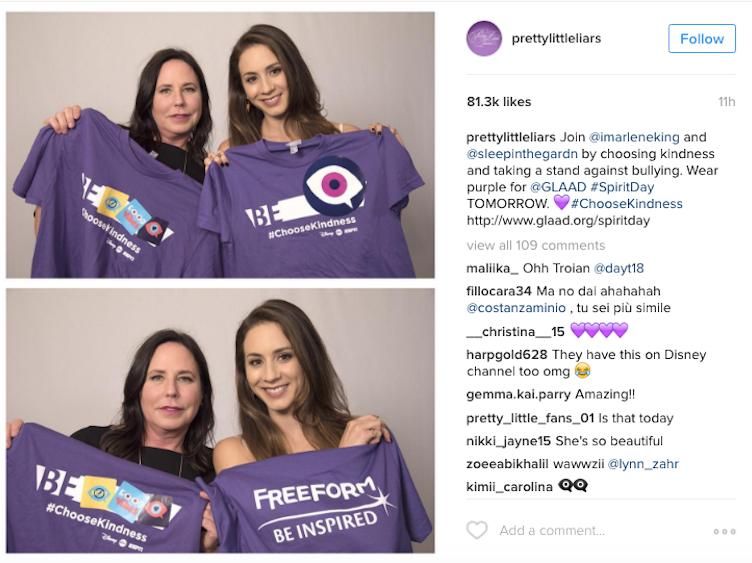 The cast of Pretty Little Liars show off their purple shirts for Spirit Day.